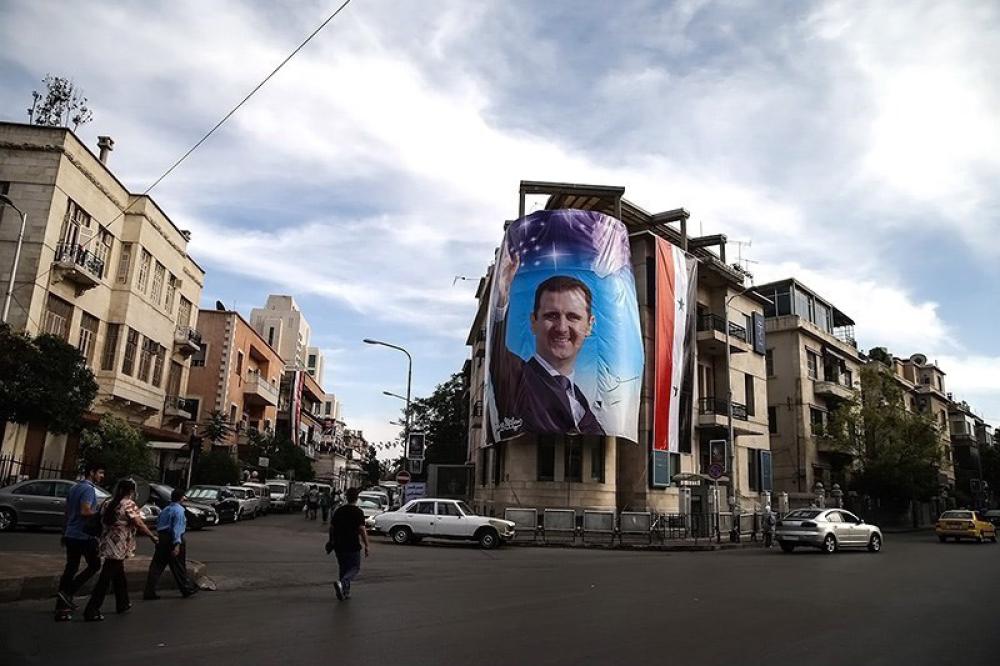 Bashar al-Assad poster in Damascus in 2012