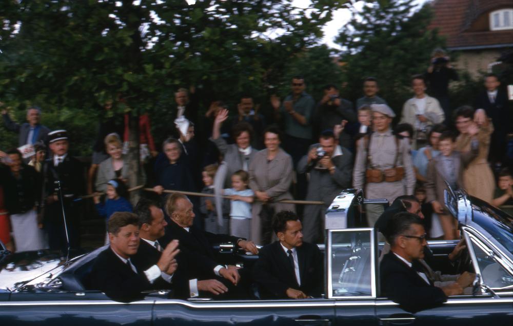 John Kennedy leaving Tegel Air Base (Berlin) with Chancellor Konrad Adenauer and Mayor Willy Brandt. En route to making "Ich bin ein Berliner" speech.