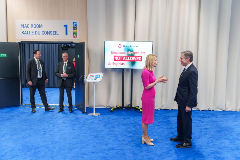 Secretary of State Antony Blinken speaks with Prime Minister of Estonia Kaja Kallas during the NATO Summit Tuesday, July 11, 2023, at the NATO exhibition site in Vilnius, Lithuania. (Official White House Photo by Adam Schultz)