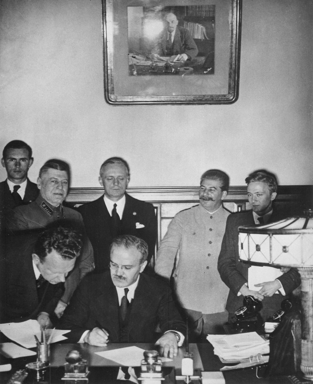 Soviet Foreign Minister Vyacheslav Molotov signs the German–Soviet Treaty of Friendship