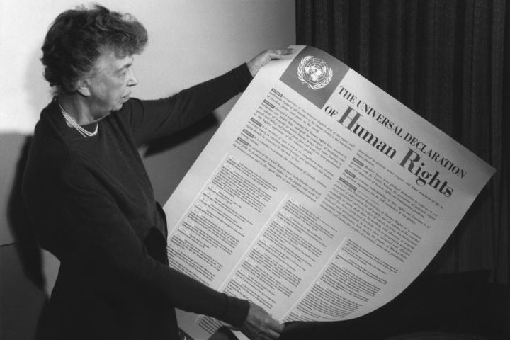 Eleanor Roosevelt holding poster of the Universal Declaration of Human Rights