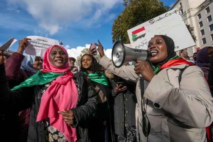 Supporters of the Alliance of Sudanese Political Forces (ASPF) protest in front of 10 Downing Street, London